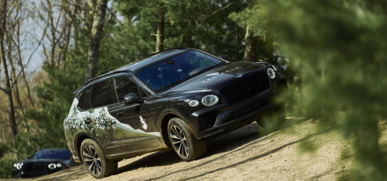 Bentley Bentayga tackling the moguls at the Bentley Off-Road Experience at The Preserve in Rhode Island