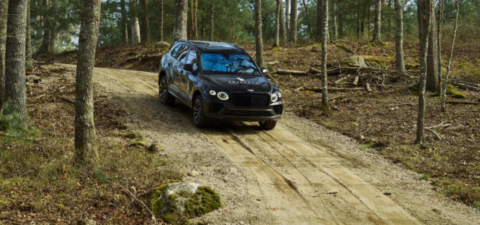 Bentley Bentayga using Hill Descent Control to tackle a steep incline during the Bentley Off-Road Experience at The Preserve in Rhode Island