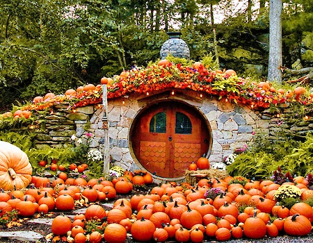 Exterior view of The Preserve's Hobbit House with fall decorations.