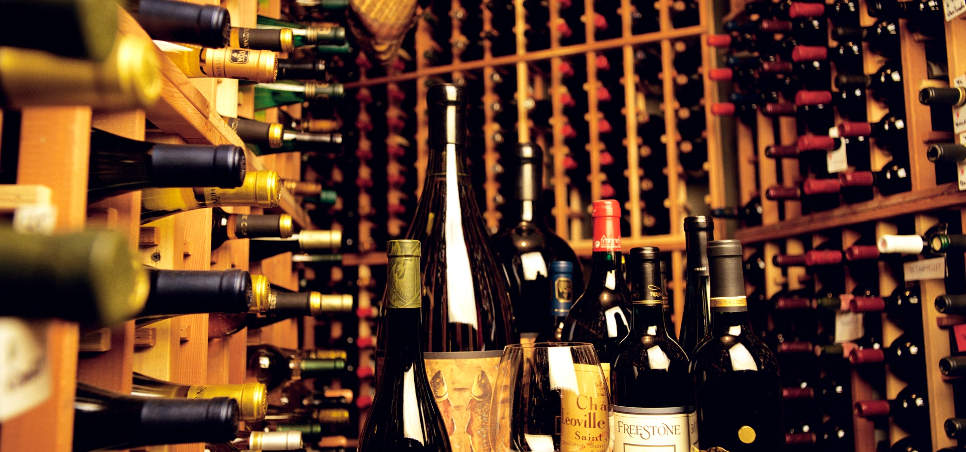 Wine cellar at The Preserve Resort & Spa showcasing a variety of fine wines.